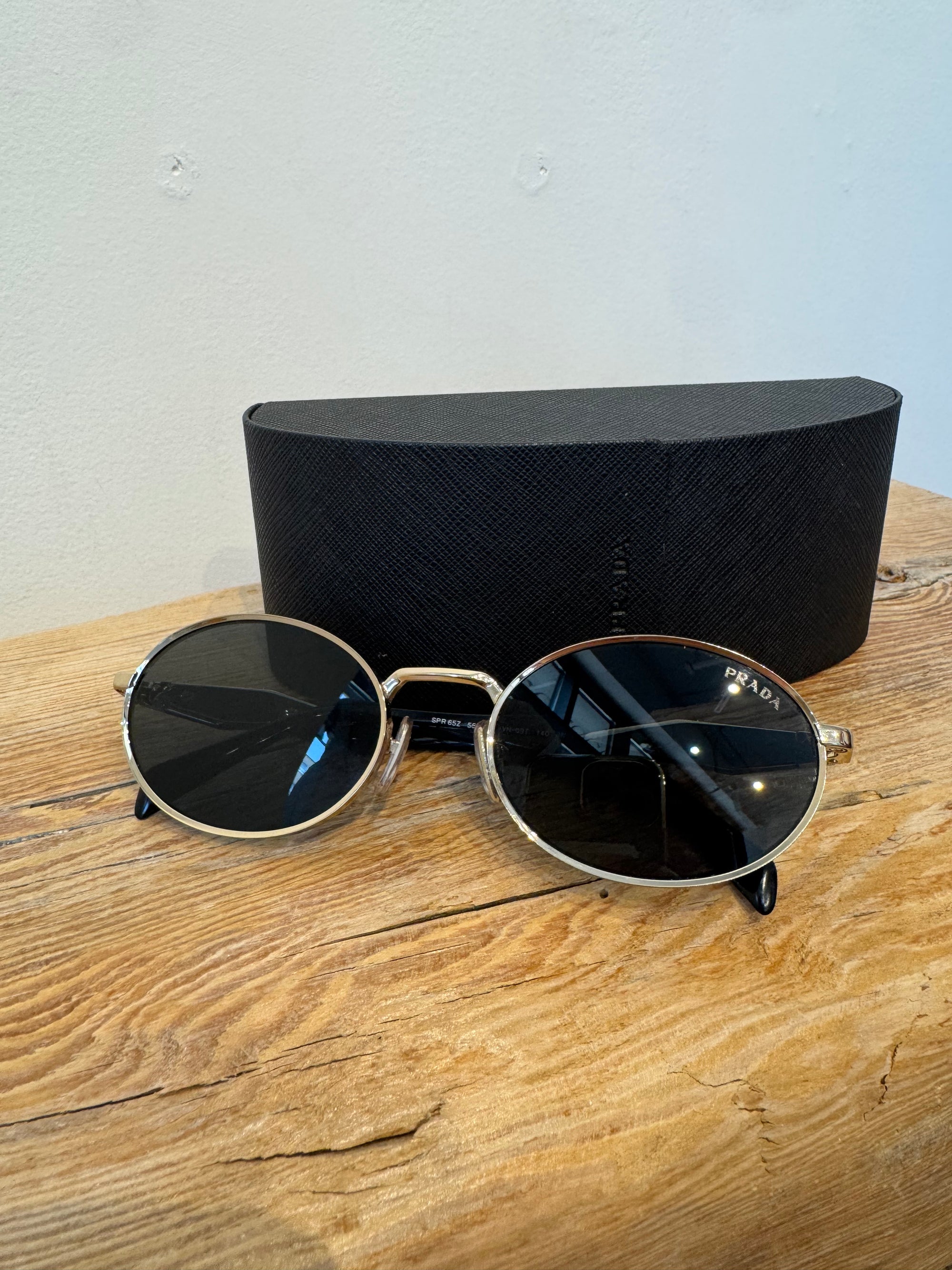 Prada oval sunglasses, Black/Gold