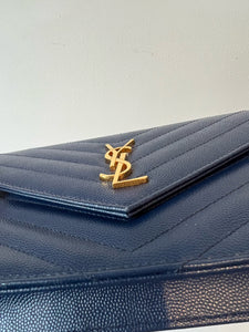 Saint Laurent Cassandre matelassé envelope leather wallet on chain -  Realry: Your Fashion Search Engine